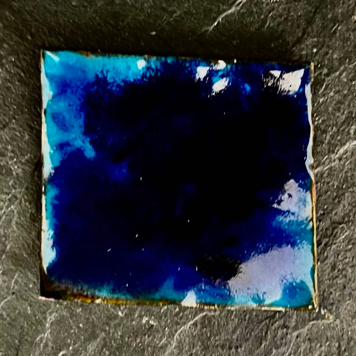 Reverse side of Baby Pigeons — contra enamel on copper, deep navy and teal tones with cloud-like texture. Unique enamel miniature, 40 × 36 mm. House Zoo series by A. Fraction, Vilnius.