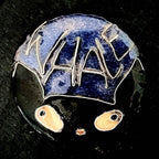 Whale Cat – original cloisonné enamel miniature on a round copper disc, front view on dark slate. A black cat with amber eyes and the blue sky reading "WHALE" in fine silver wire. House Zoo collection original artwork by A. Fraction.