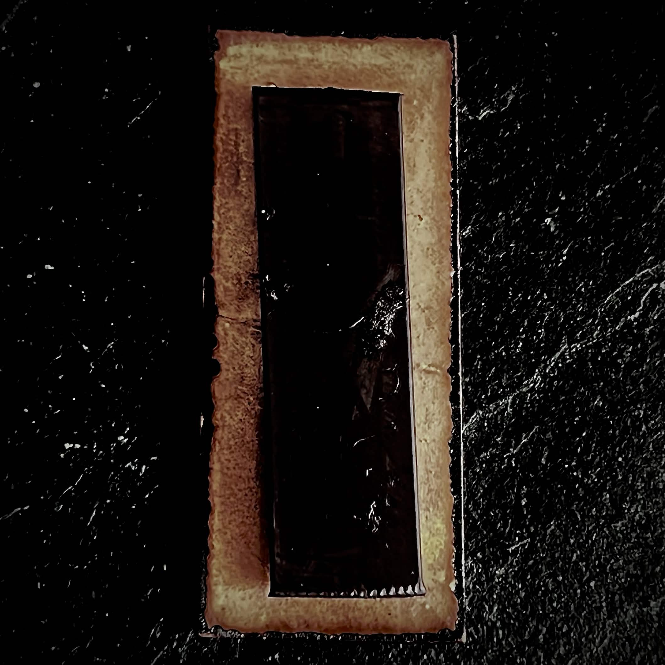 Reverse/back — Reverse of Micro Cat showing bare copper with contra enamel, rectangular form, 40×16mm enamel artwork by A. Fraction