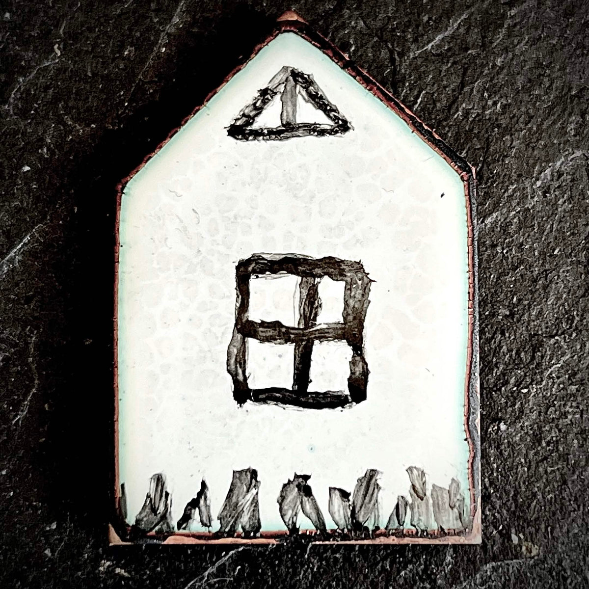 Little House — vitreous enamel on copper miniature, house-shaped, with painted window and grass detail, pale blue-white surface with copper border, 23 × 35 mm, by A. Fraction