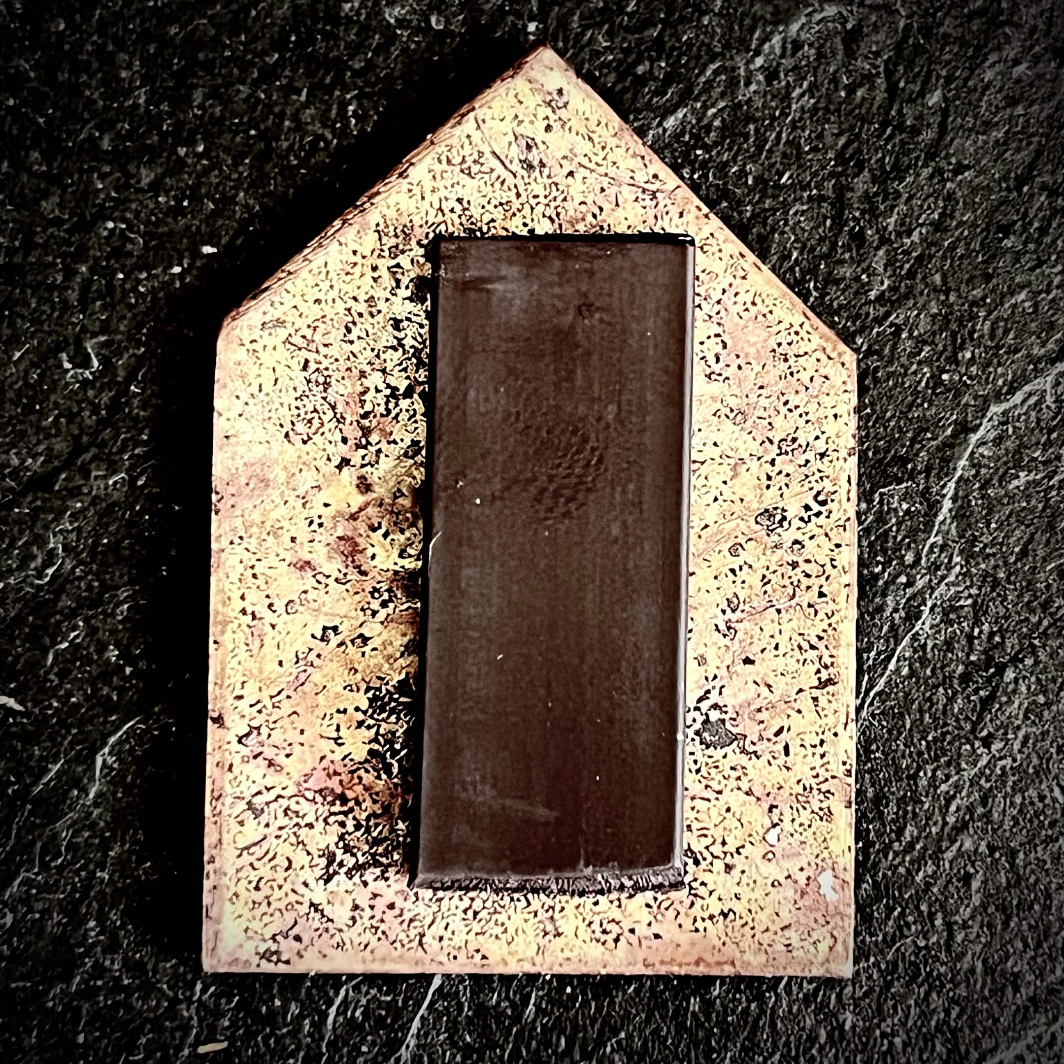 Little House reverse — bare copper back with repurposed rubber magnet mount, warm oxidised texture, house silhouette, by A. Fraction